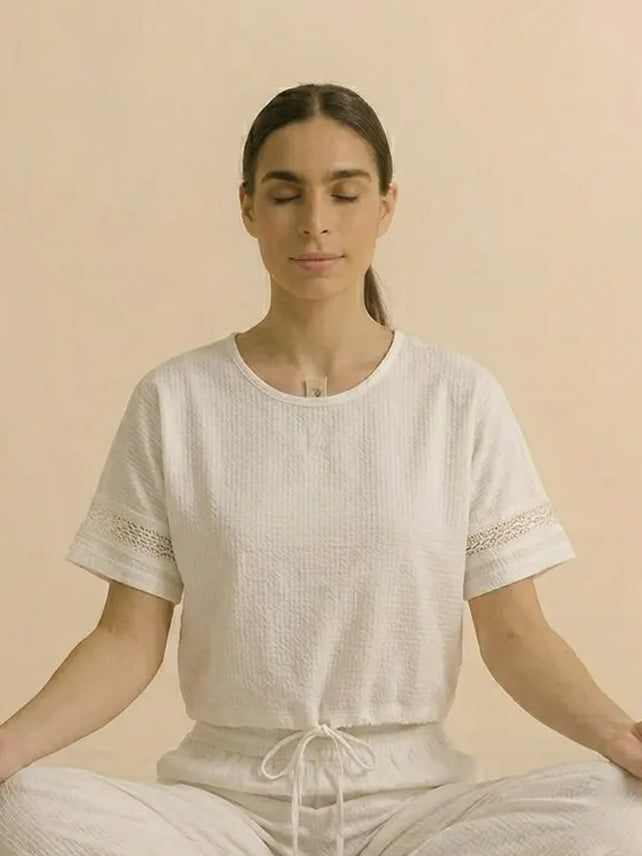 Woman Doing Yoga in Short Sleeve White Yoga Top
