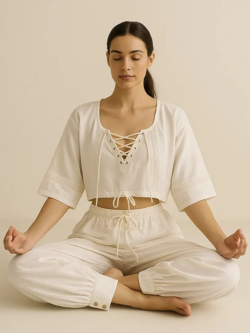 Women with White Yoga Top in Dhyana Pose 